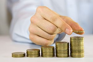 hand stacking coins